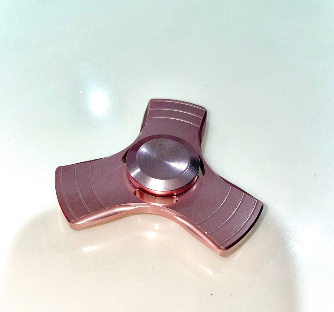 rose gold fidget toy EyezOff Rose Gold Fidget Spinner Aluminium Alloy Material 3-min Rotation  Time main image 0