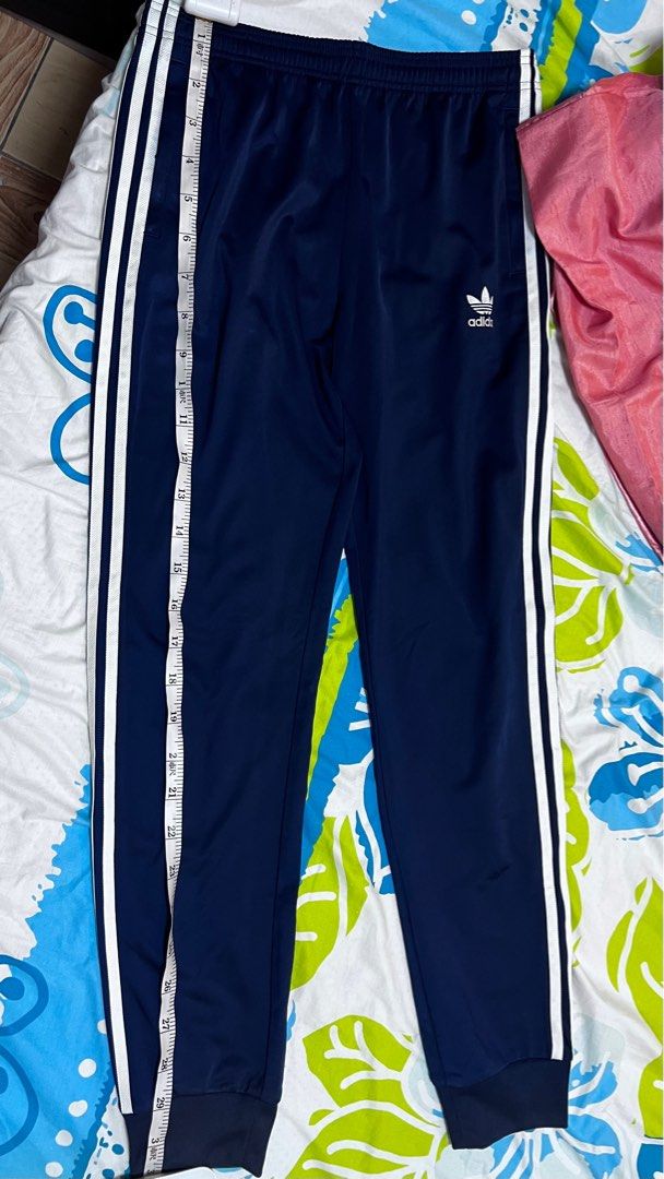 ADIDAS TRACK PANTS (Category: Joggers) located in Manila. Submitted by declutterwithceej (Listing ID 1307727359, Image 1). Description: used 3 times only. 9.5/10 condi original price is at 3k+ in adidas.