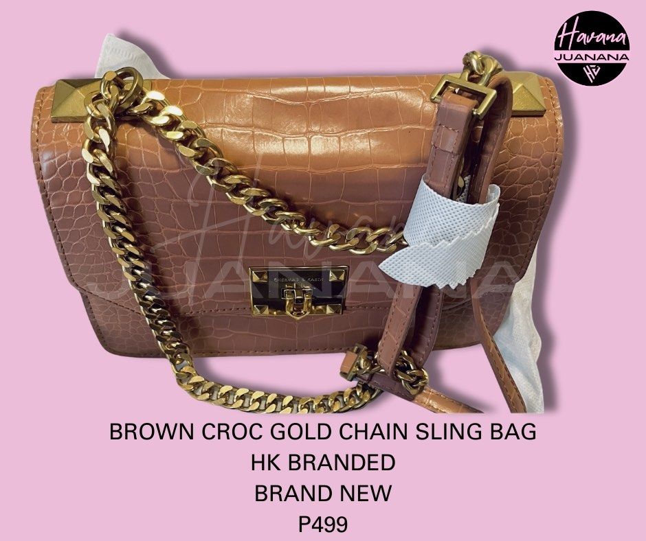 Brown Sling Bag w/ Gold Chain (Category: Sling Bags) located in Pasig City. Submitted by wangderfulworld (Listing ID 1298278450, Image 1). Description: 𝘽𝙧𝙖𝙣𝙙 𝙣𝙚𝙬 𝙃𝙆 𝙗𝙧𝙖𝙣𝙙𝙚𝙙 (𝘾𝙣𝙆 𝙞𝙣𝙨𝙥𝙞𝙧𝙚𝙙) 𝖶𝗂𝗍𝗁 𝗍𝖺𝗀 𝖺𝗇𝖽 𝖽𝗎𝗌𝗍 𝖻𝖺𝗀 𝖢𝗋𝗈𝖼𝗈𝖽𝗂𝗅𝖾 𝖯𝖴 𝗅𝖾𝖺𝗍𝗁𝖾𝗋 𝗆𝖺𝗍𝖾𝗋𝗂𝖺𝗅 𝖬𝗎𝗅𝗍𝗂𝗉𝗅𝖾 𝖼𝗈𝗆𝗉𝖺𝗋𝗍𝗆𝖾𝗇𝗍𝗌 𝖠𝖽𝗃𝗎𝗌𝗍𝖺𝖻𝗅𝖾 𝗌𝗅𝗂𝗇𝗀 𝖦𝗈𝗅𝖽 𝗁𝖺𝗋𝖽𝗐𝖺𝗋𝖾 P499 only 𝘗𝘈𝘠𝘔𝘌𝘕𝘛 𝘍𝘐𝘙𝘚𝘛 + �