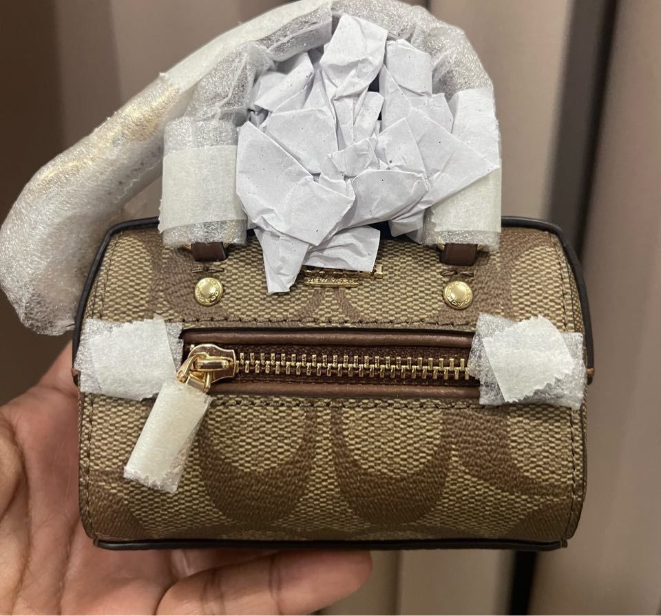 Coach Micro Rowan & Coach Chain Strap (Category: Luxury Bags & Wallets) located in Makati City. Submitted by thestylearchive (Listing ID 1307622317, Image 2). Description: Original Coach Micro Rowan and Coach chain strap rfs: decluttering.