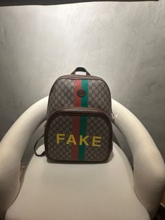 Gucci fake/not medium backpack