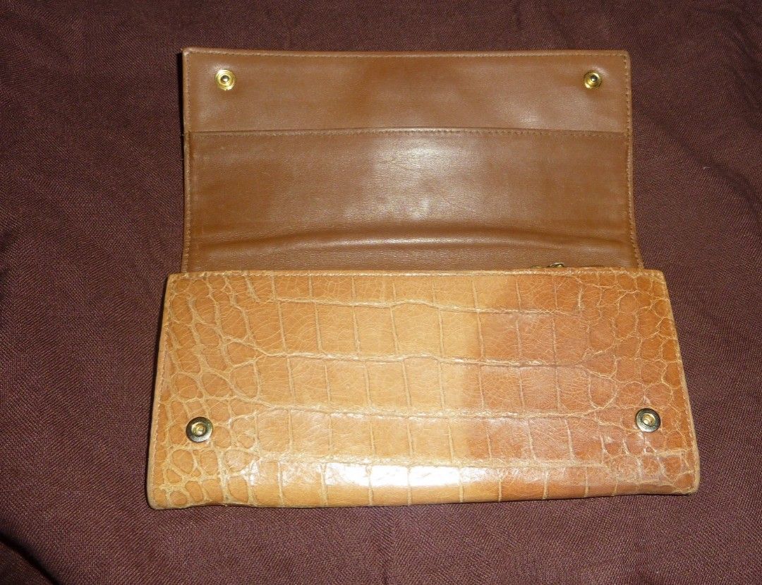 Miu Miu Crocodile Embossed Long Wallet (Category: Luxury Bags & Wallets) located in Calapan. Submitted by estheronl (Listing ID 1269634786, Image 3). Description: Miumiu long wallet Authentic Flaws: Nag-dark na color sa ibang parts, fading sa metal Mop: Gcash, Paymaya, Bpi Shipping couriers: J&t, LBC Shipping sched: Wed, Sat..