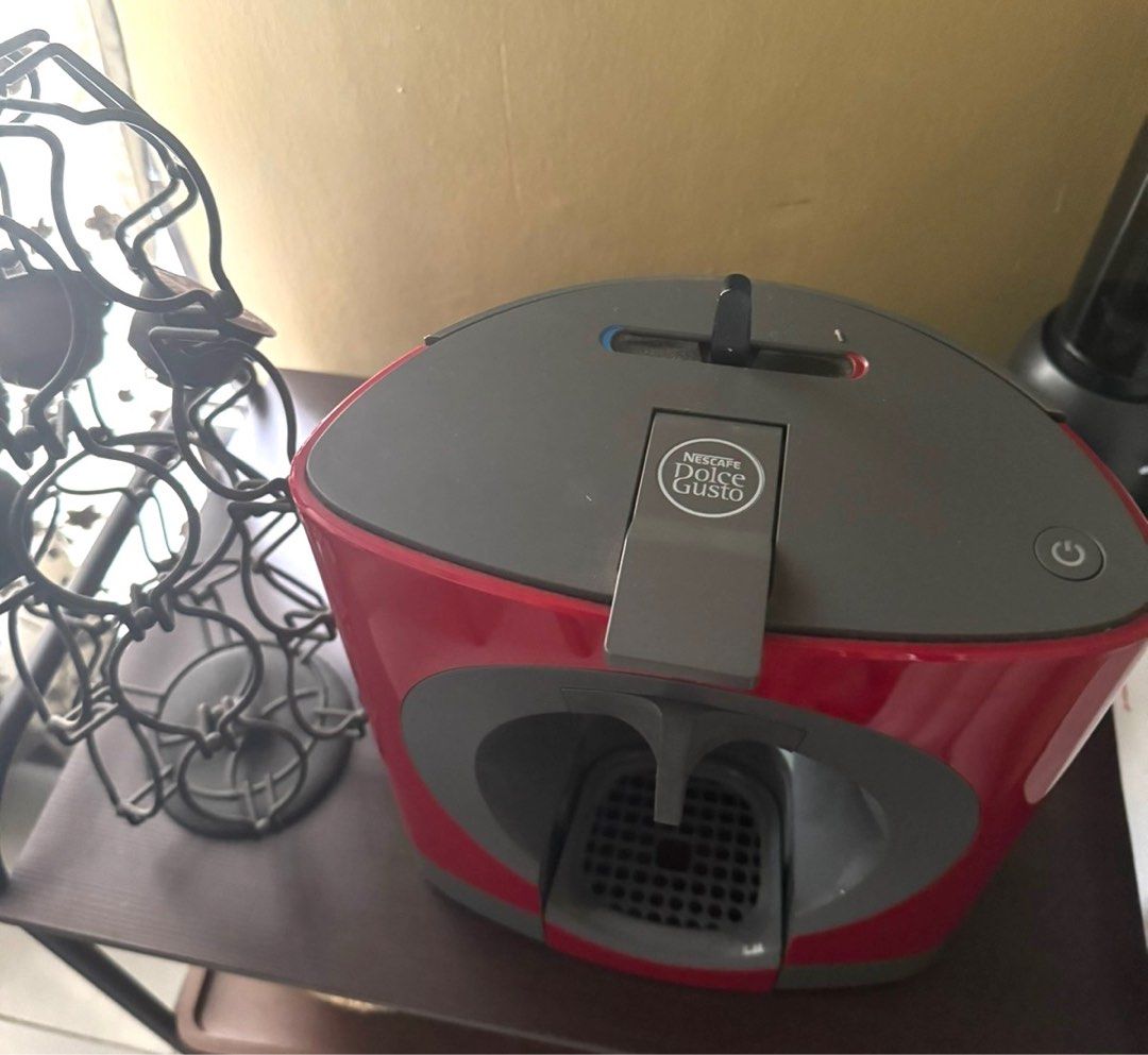 Coffee Machine (Category: Coffee & Tea Tableware) located in Las Pinas. Submitted by shop.at.first.sight (Listing ID 1307603318, Image 2). Description: Selling my Nescafé Dolce Gusto Coffee Machine and Capsule Coffee Pod Holder •Seldom used 📍Pick up at Upper Antipolo City.