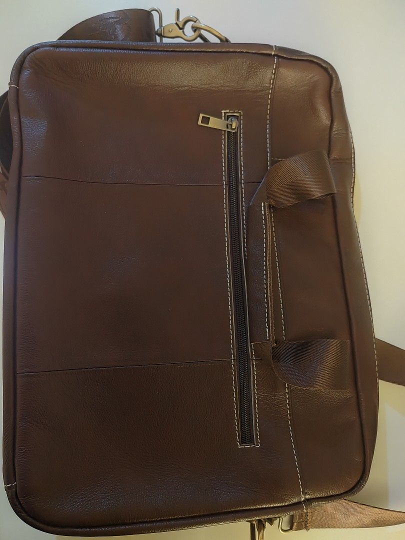 BULLCAPTAIN Genuine Leather Men's Briefcase (Category: Luxury Bags & Wallets) located in Makati City. Submitted by cmpasion (Listing ID 1307805281, Image 1). Description: New Genuine Leather bag Can accomodate 14.7" laptop. High quality business tote bag..
