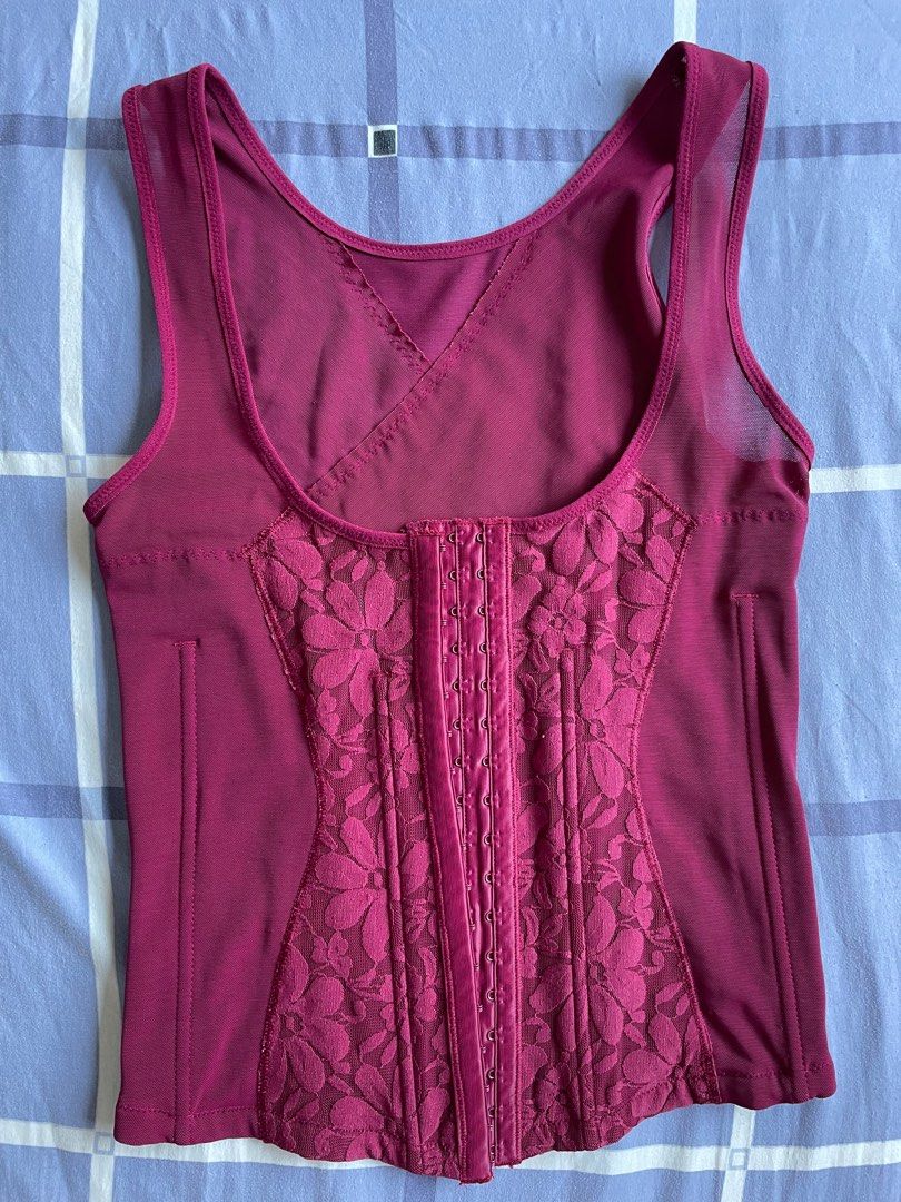 Corset Body Shaper (Category: Undergarments & Loungewear) located in Pasig City. Submitted by summermid (Listing ID 1307786807, Image 1). Description: Corset body shaper Wine red Best fit: Small to medium RFS: Decluttering.