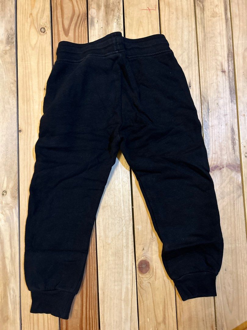 H&m black jogger pants sales