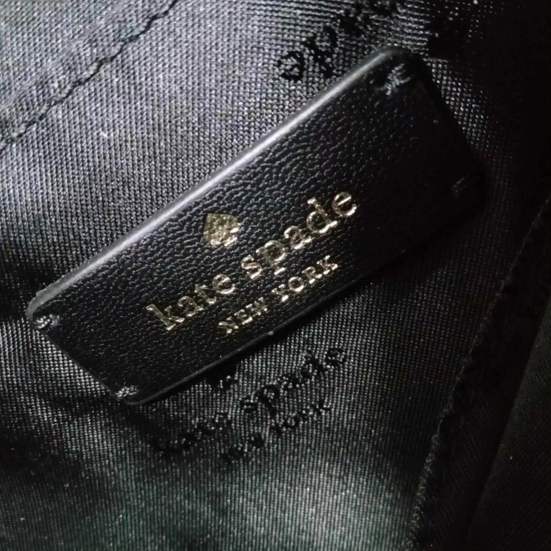 Kate Spade Black Large Zipper Tote (Category: Luxury Bags & Wallets) located in Taguig. Submitted by esa.agustin (Listing ID 1307818583, Image 3). Description: Original Kate Spade black nylon large zipper tote bag. Has 2 side compartments for water tumbler and 1 compartment inside for laptop. With tag. Bouhgt in US..