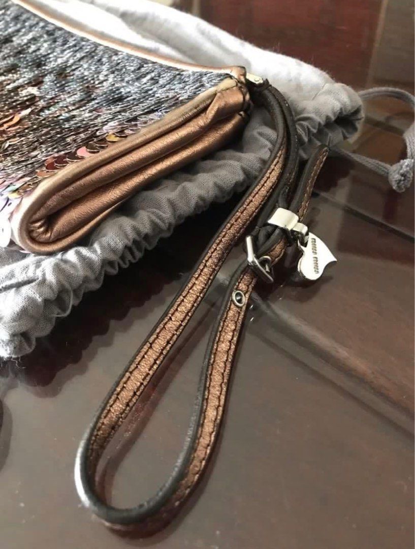 Miu Miu Clutch (Category: Luxury Bags & Wallets) located in Manila. Submitted by dashlux (Listing ID 1307874621, Image 2). Description: Item will be ship out around August since I’m currently out of the country. But can reserve now bag 💼 Rare item 🍂 Up for grabs now 💕 .