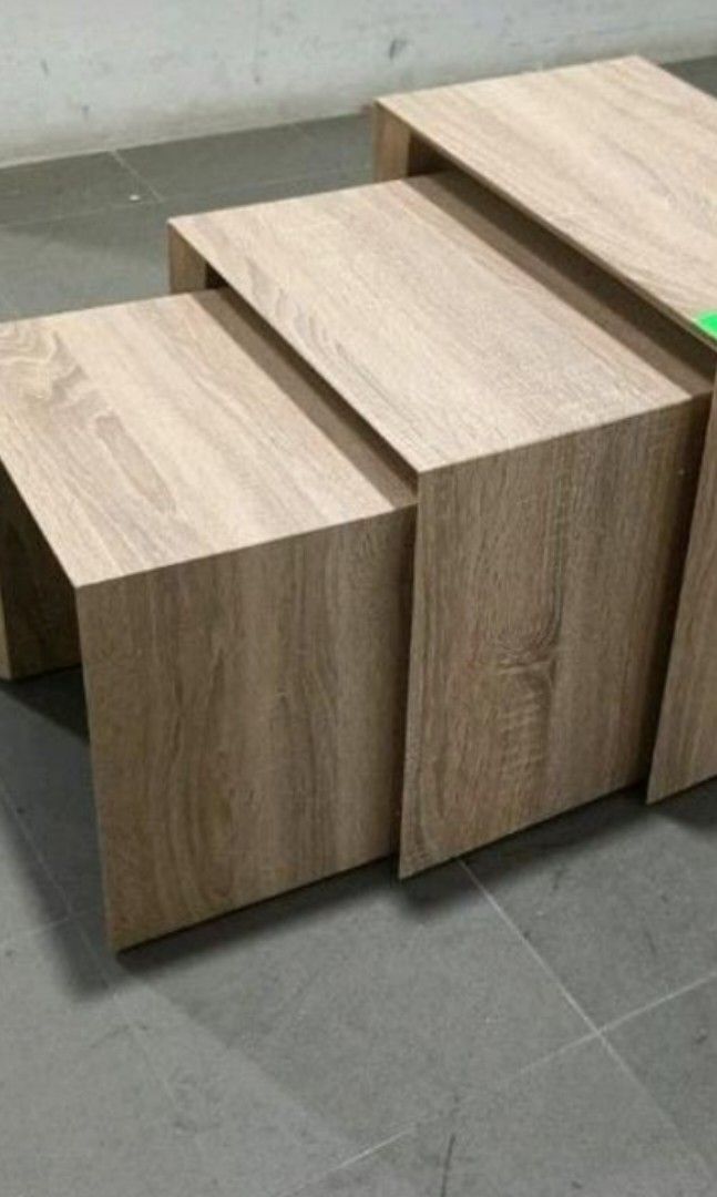 Nesting Table (Category: Other Home Furniture) located in Singapore. Submitted by rtherapy (Listing ID 1307889838, Image 3). Description: lightly used oak table. nice decoration and easy to keep. arrange own pick up and on weekdays night after 830pm or Sunday after 5pm due to busy schedule. biggest table length 43cm breath 30cm ( for all 3 tables ) height 39cm middle length 37cm breath 30cm height 36cm.