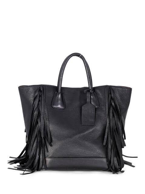 Original Prada Fringe Bag (Category: Luxury Bags & Wallets) located in Makati City. Submitted by luxedeclutter (Listing ID 1307933990, Image 1). Description: With Dust Bag Authentic barely used.