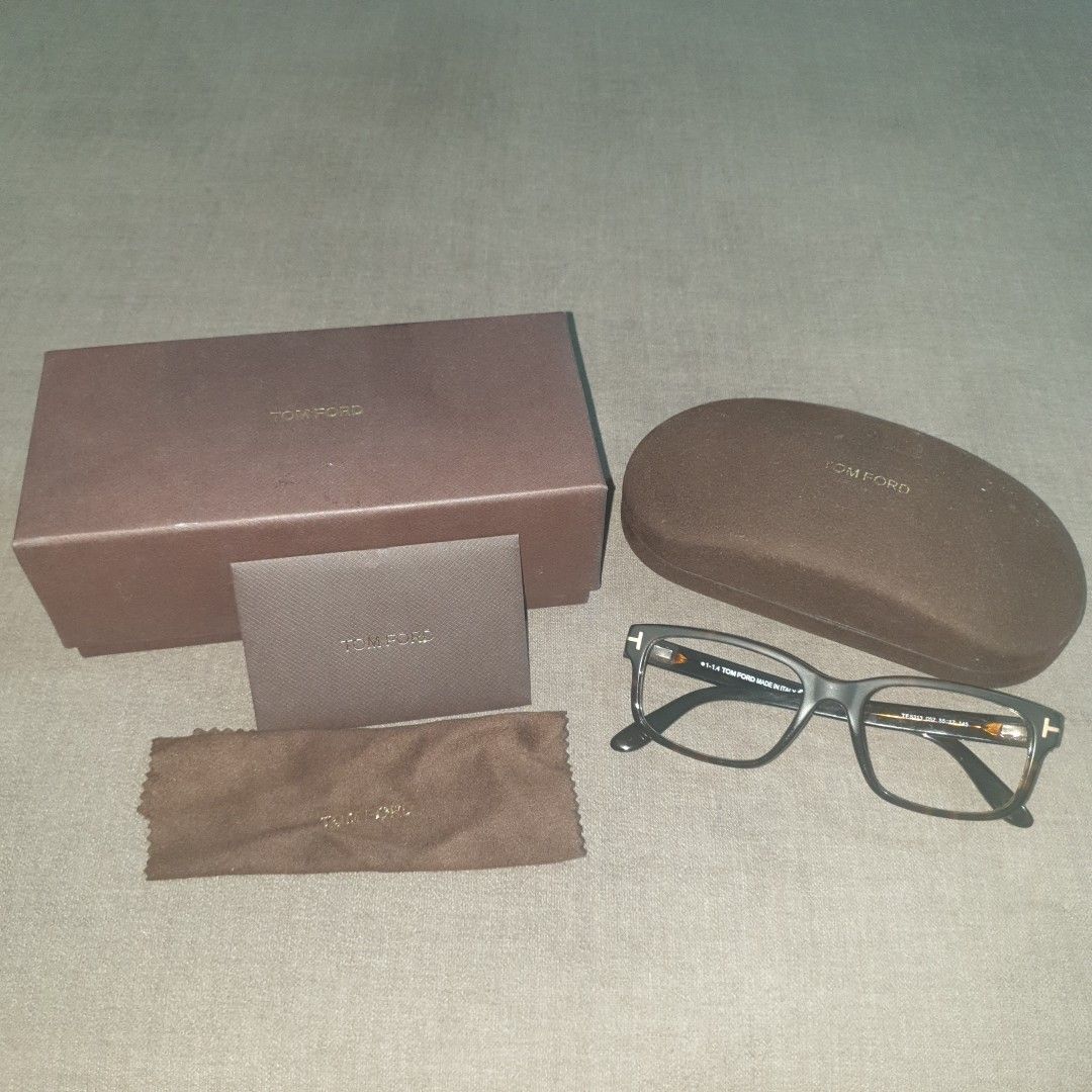 TOM FORD EYEGLASSES FRAME (Category: Sunglasses & Eyewear) located in Muntinlupa City. Submitted by eiramceegee (Listing ID 1307908106, Image 1). Description: no lens frame only authentic complete inclusions. only issue: fading of tom ford logo (see 6th photo). Hinges are NOT loose. LAST PRICE POSTED SHIPPING TO BE HANDLED BY BUYER. PAYMENT FIRST. NOT BRANDNEW WHAT YOU SEE IS WHAT YOU GET. REFER TO THE PHOTOS..