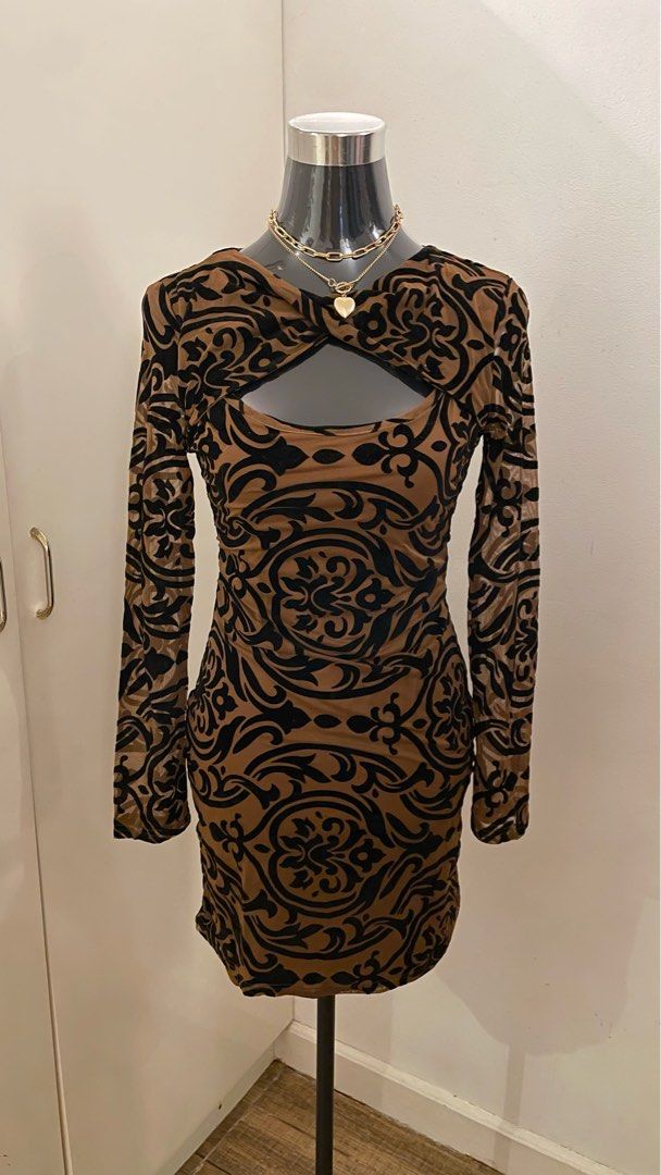 Brown Fitted Dress (Category: Dresses) located in Quezon City. Submitted by declutterxcloset (Listing ID 1311712903, Image 1). Description: .