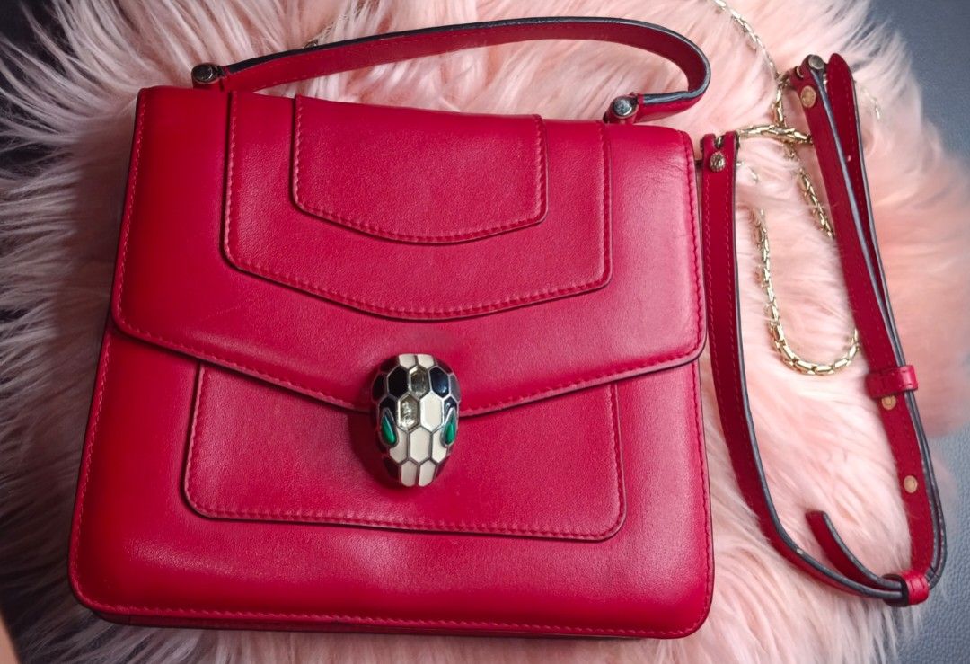 BVLGARI Serpenti Forever Bag (Category: Luxury Bags & Wallets) located in Legazpi City. Submitted by georgepineda791 (Listing ID 1311872439, Image 1). Description: This pre-loved piece shows some wear with dirt on the linings, two missing front studs, and tarnished closure hardware. Grab this luxury bag at a reduced price!.