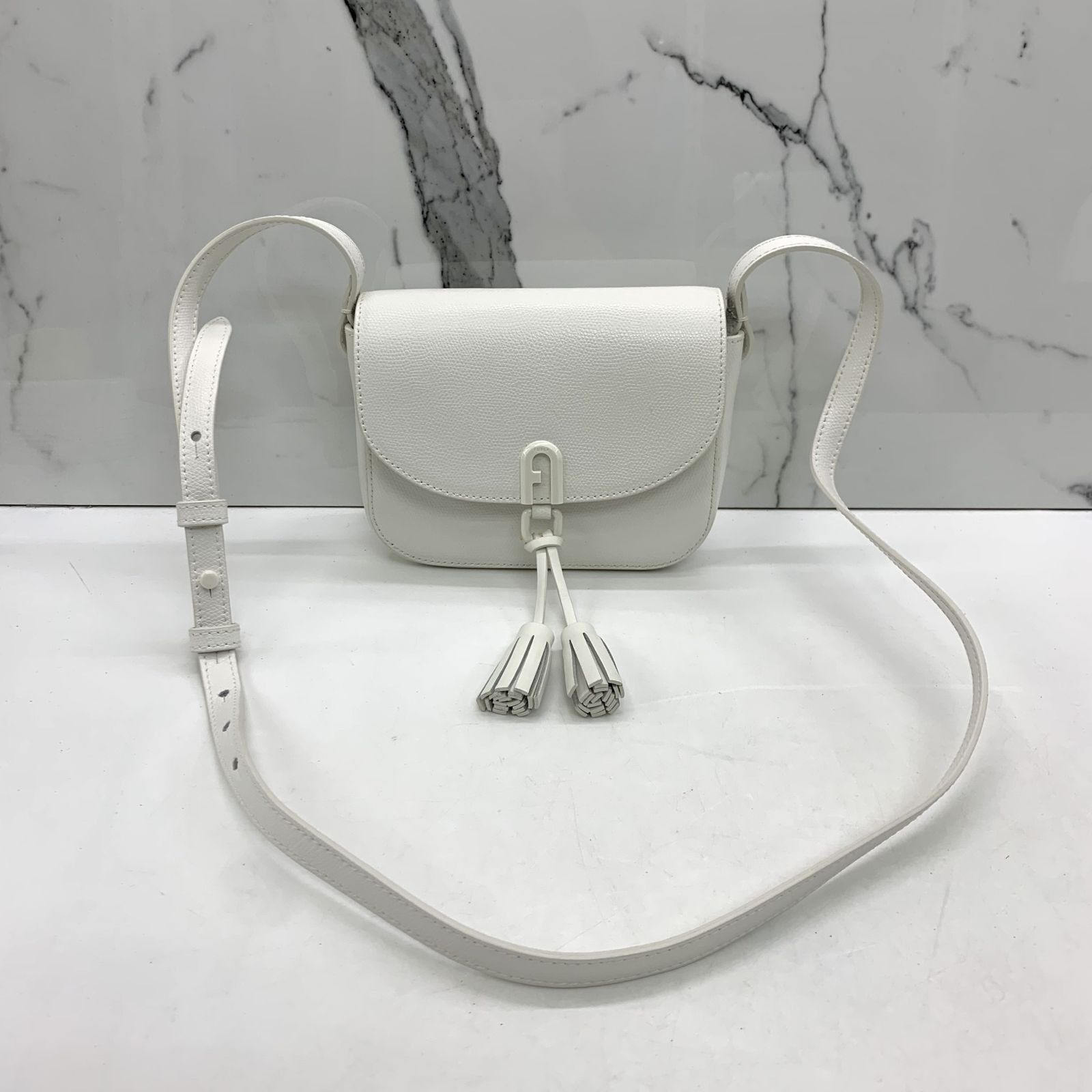 Furla tassel deals