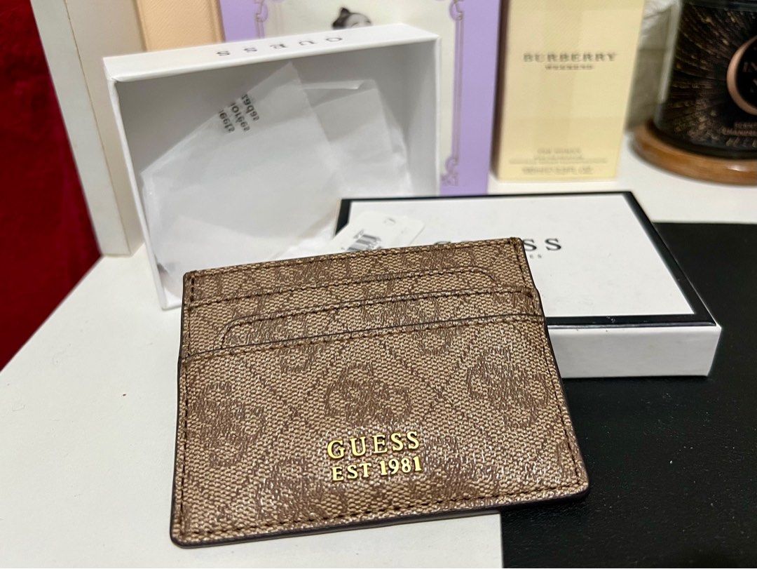 Authentic Guess Monogram Patterned Laurel Card Holder (Category: Luxury Bags & Wallets) located in Manila. Submitted by prelovedbyaiah (Listing ID 1311867674, Image 1). Description: MOP: BPI/Seabank/Gcash.
