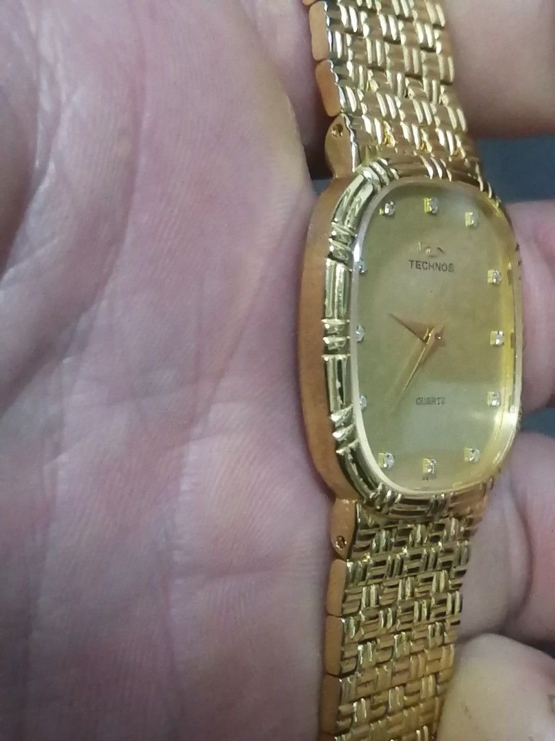 Rare full gold Technos Swiss quartz watch not automatic watch