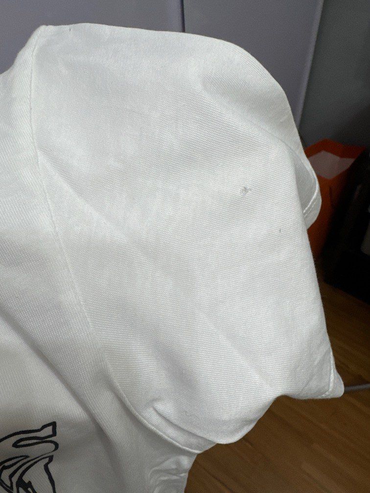 Uniqlo Marvel UT shirt (Category: Shirts) located in Makati City. Submitted by frequent.flyer (Listing ID 1311813954, Image 3). Description: Brand new, never worn. Selling LOW cause I saw the holes :-( please see pics for reference Marvel’s Black Widow Print Mens XS, Womens M-L XS on Tag buy This fits M-L womens This might be a little loose on Size S girls Exact measurements below Inches: L - 25.5 W - 18 Shoulders - 17.5 Sleeves - 8 Armhole - 7.2
