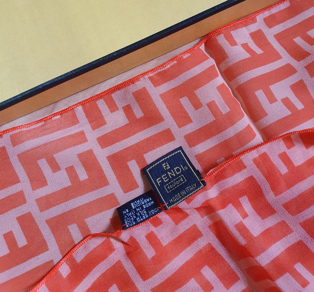 Fendi Logo Scarf (Category: Luxury Accessories) located in Manila. Submitted by mybrandshop (Listing ID 1313555531, Image 2). Description: Fendi Logo Orange Silk Scarf Authentic bought in Japan 41 cm x 100 cm.