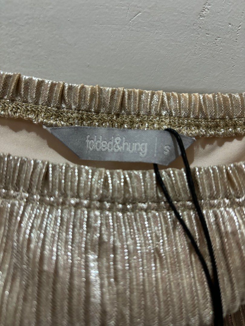 folded & hung | Metallic Tube Pleated Top (Category: Sleeveless) located in Makati City. Submitted by axashop (Listing ID 1313535169, Image 2). Description: - Never been worn - Price is negotiable, just message me..