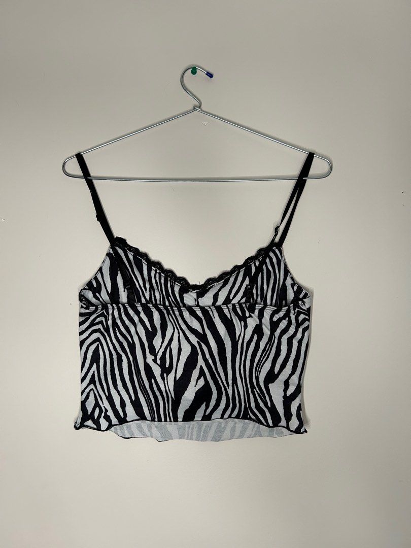 Fun Zebra Print Lacey Accent Thin Strap Crop Top (Category: Clothes) located in Toronto. Submitted by venya260 (Listing ID 1313457167, Image 3). Description: Brand: Shien Size: US S Colour: Black and White Clothing Blend: 92% Polyester & 8% Spandex Condition: Used .