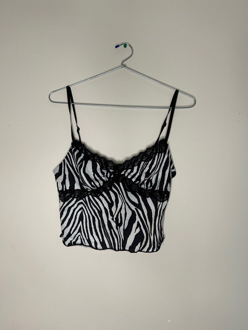 Fun Zebra Print Lacey Accent Thin Strap Crop Top (Category: Clothes) located in Toronto. Submitted by venya260 (Listing ID 1313457167, Image 2). Description: Brand: Shien Size: US S Colour: Black and White Clothing Blend: 92% Polyester & 8% Spandex Condition: Used .