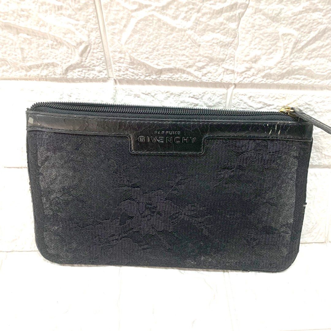 Givenchy Pouch Black Lace (Category: Luxury Bags & Wallets) located in Manila. Submitted by thekidshop (Listing ID 1313541149, Image 1). Description: Aunthentic Stored Has scratches.