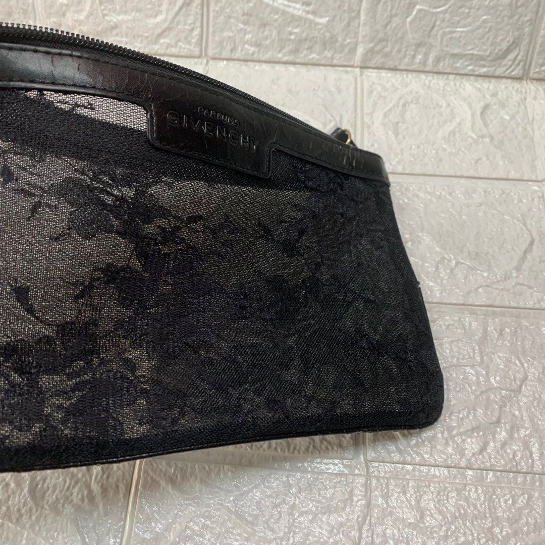 Givenchy Pouch Black Lace (Category: Luxury Bags & Wallets) located in Manila. Submitted by thekidshop (Listing ID 1313541149, Image 2). Description: Aunthentic Stored Has scratches.