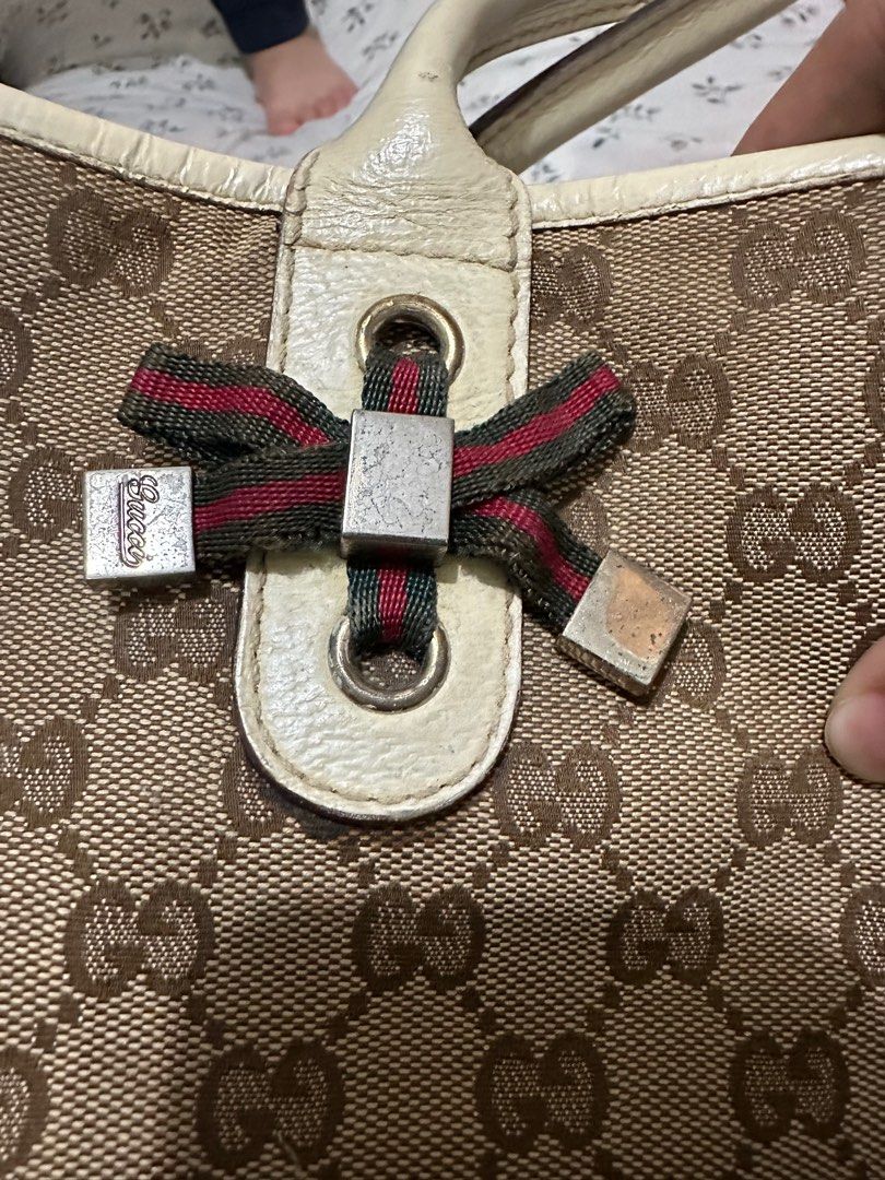 Gucci GG Sherry Line Shoulder Bag (Category: Luxury Bags & Wallets) located in Los Banos. Submitted by jeremiah31.3 (Listing ID 1313504447, Image 3). Description: Selling my well loved gucci shoulder bag. Has flaws as shown in the pics hence selling low. Can be your project bag but you can also use it as is. Straps are still in very good condition and the bag is very roomy..