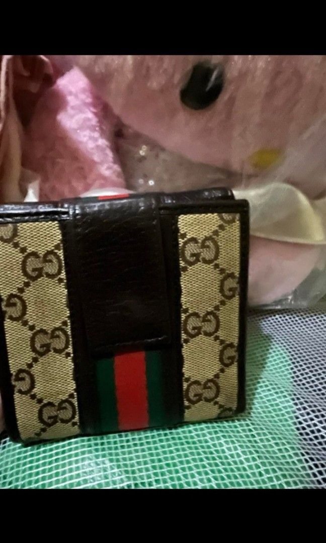 Gucci small wallet (Category: Luxury Bags & Wallets) located in Quezon City. Submitted by uptrendglam (Listing ID 1313548120, Image 1). Description: Gucci classic monogram with cherry line wallet, small in size. Guaranteed authentic..