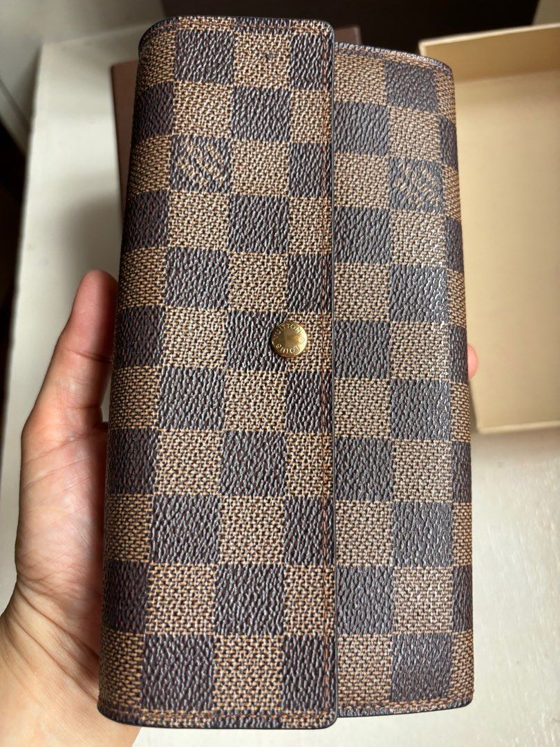Louis Vuitton Damier long wallet🇯🇵 (Category: Luxury Bags & Wallets) located in Paranaque City. Submitted by merakionlineshop (Listing ID 1313579672, Image 2). Description: LV Damier Long wallet ₱18,000 (serial # M1005) no issues 8/10 bought from Japan Inclusions : Box and paper bag .