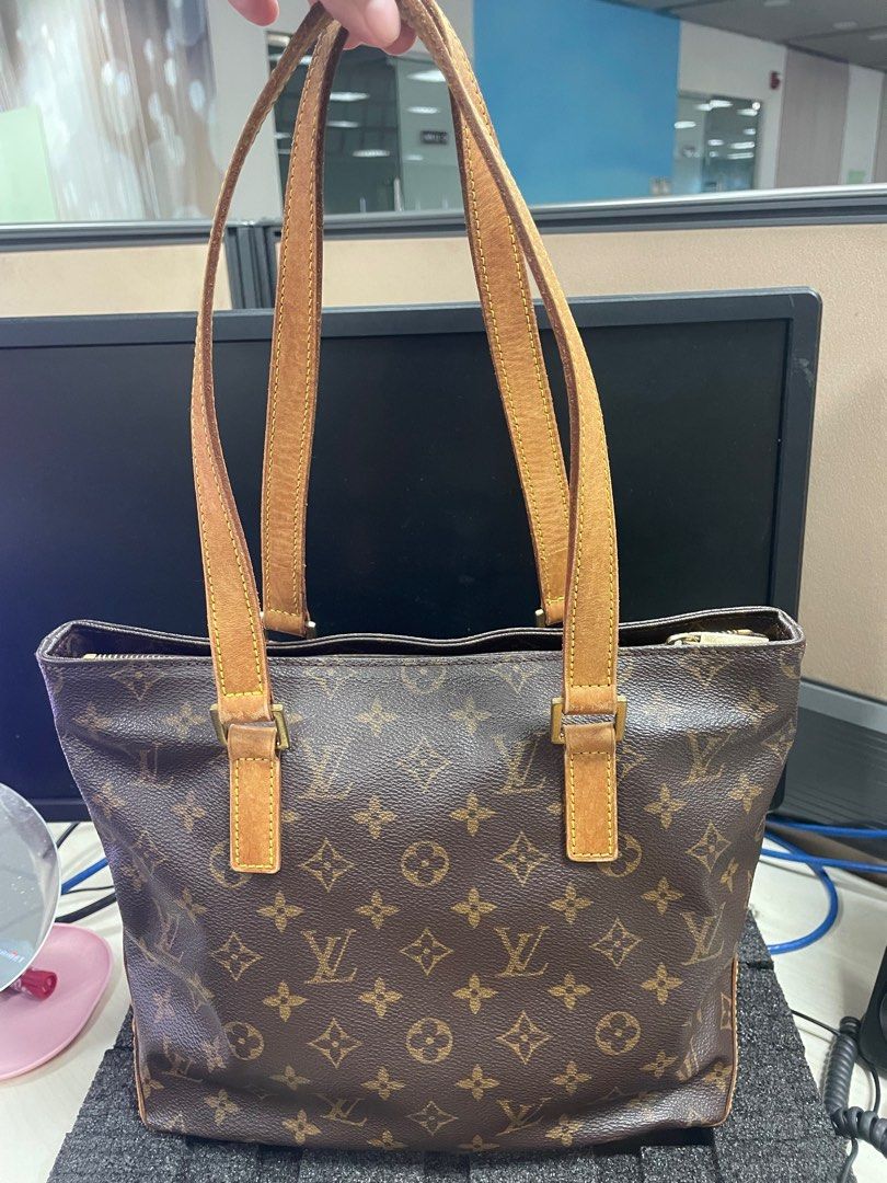 LV mono cabas piano (Category: Luxury Bags & Wallets) located in General Trias. Submitted by cris4 (Listing ID 1313543995, Image 2). Description: Selling my original LV cabas piano in PM size Preloved with signs of usage (water marks, tarnish on gold hardware) Comes with dust bag.