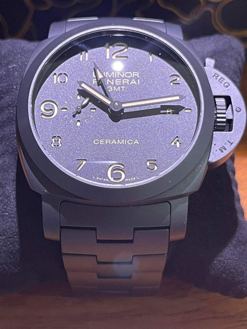 PANERAI (Category: Watches) located in Ajax. Submitted by swisswatcharena (Listing ID 1313510304, Image 1). Description: Brand - PANERAI Model Name - PANERAI PAM 438 LUMINOR GMT CERAMIC Officine Panerai Tuttonero Luminor 1950 Movement - Automatic self-winding movement Year - 2015 Case - Matt black ceramic case cushion shaped case 44.0 mm in diameter. Panerai patented crown protector. Exhibition sapphire case back. Small window is visible in the c