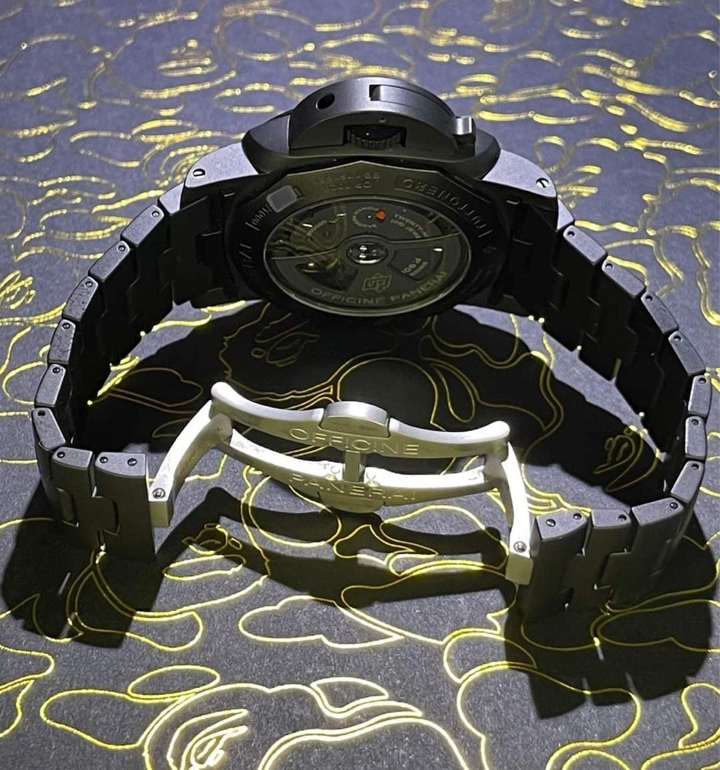 PANERAI (Category: Watches) located in Ajax. Submitted by swisswatcharena (Listing ID 1313510304, Image 2). Description: Brand - PANERAI Model Name - PANERAI PAM 438 LUMINOR GMT CERAMIC Officine Panerai Tuttonero Luminor 1950 Movement - Automatic self-winding movement Year - 2015 Case - Matt black ceramic case cushion shaped case 44.0 mm in diameter. Panerai patented crown protector. Exhibition sapphire case back. Small window is visible in the c