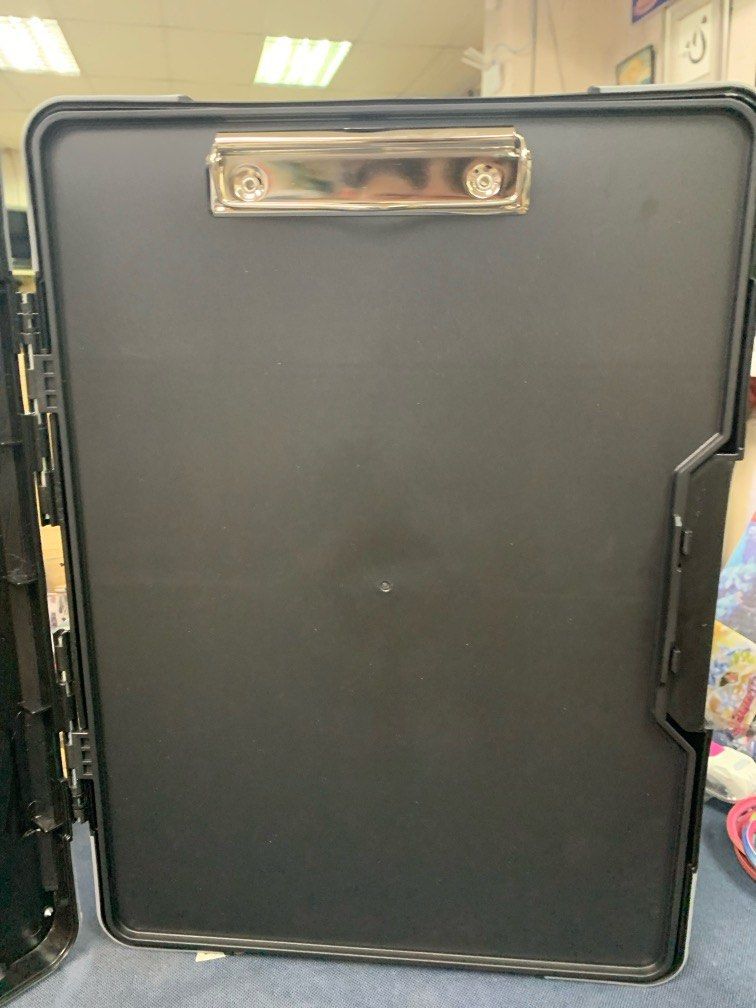 Tactix clipboard organiser (Category: Storage Boxes & Baskets) located in Pasay City. Submitted by ayinong168 (Listing ID 1313517931, Image 2). Description: Hard case multi-organiser Compartments for safe storage Internal & external steel paper clip Ideal dimensions for holding A4 paper Designed for well organised storage of documents, stationary and tablet devices. This product will help keep all of your important documents together in a protect