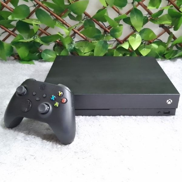 Xbox One X 1787 1TB (Category: Xbox) located in Paranaque City. Submitted by ivy69425 (Listing ID 1313431822, Image 2). Description: Brand: Xbox Model: 1787 Condition: Slightly Used/Working/With Box Year Manufactured: 2017 Features: • Platform Microsoft Xbox One • Region Code Region Free • Storage Capacity 1TB • Connectivity HDMI, USB-A • Resolution 4K (UHD) • Features Blu-Ray Compatible, Wi-Fi Capability, Internet Browsing • Type Home Console.