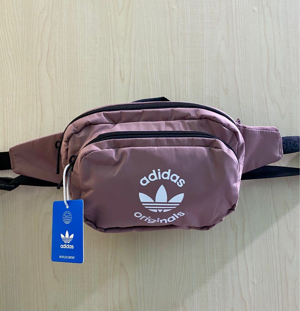 Adidas Belt Bag — Unisex (Category: Belt bags, Clutches and Pouches) located in Lipa City. Submitted by _flor_ (Listing ID 1313663310, Image 1). Description: Adidas Belt Bag - Unisex ‼️ONHAND‼️Guaranteed 💯 Authentic Approx. size: 10” (L) x 6.5” (H) x 3.5” (W) Features: * Top zip closure * Adjustable waist strap * External zip pocket * Polyester in construction * With tag, no paper bag * Color- Old rose Php 1,350 plus sf Courier: LBC Location: Li