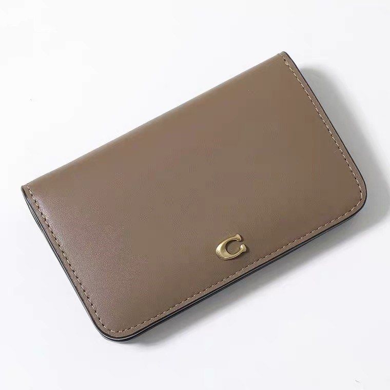 Coach slim cardcase/coin purse (Category: Luxury Bags & Wallets) located in Las Pinas. Submitted by yhn_boutique (Listing ID 1313621556, Image 1). Description: 📌Actual pic posted 📌cod via lalamove/ grab 📌J&T pay today ship today 📌 complete inclusions .