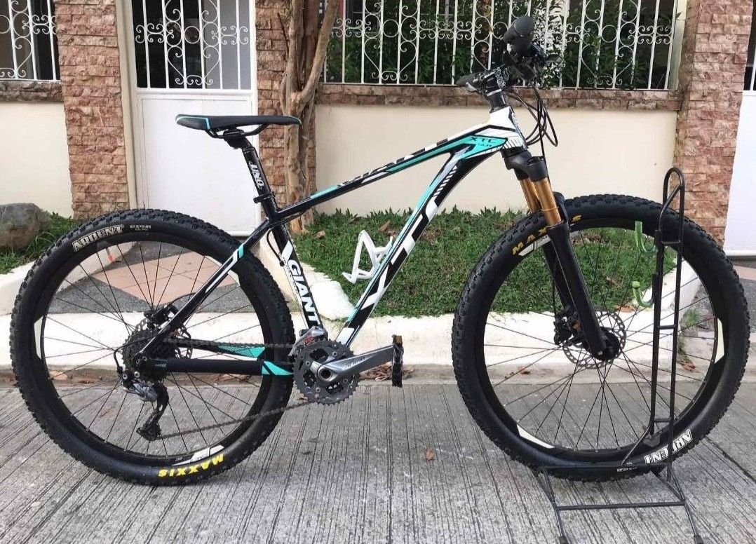 Giant XTC (Category: Bicycles) located in Quezon City. Submitted by caseybrian47891 (Listing ID 1306826912, Image 2). Description: Giant XTC MTB Still looks new, very slightly used this Giant XTC MTB size Medium 17 Frame Mint Green color has an internal cabling system , 27.5 Cole Air Fork ( stealth black ),Atomic Short Stem, Maxxis Ardent 27.5x2. 3 Tires , Shimano Alivio 3x9 speed Groupset, UNo Seatpost, Selle San Marco Saddle ( black w mint gree