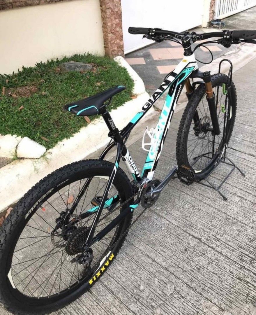 Giant XTC (Category: Bicycles) located in Quezon City. Submitted by caseybrian47891 (Listing ID 1306826912, Image 3). Description: Giant XTC MTB Still looks new, very slightly used this Giant XTC MTB size Medium 17 Frame Mint Green color has an internal cabling system , 27.5 Cole Air Fork ( stealth black ),Atomic Short Stem, Maxxis Ardent 27.5x2. 3 Tires , Shimano Alivio 3x9 speed Groupset, UNo Seatpost, Selle San Marco Saddle ( black w mint gree