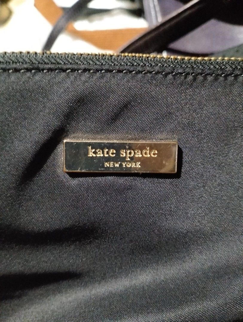Kate Spade tote chain bag (Category: Luxury Bags & Wallets) located in Makati City. Submitted by katniss_preloved (Listing ID 1313680355, Image 2). Description: 📢 SALE!!! P1299 only!!! Original Kate Spade tote chain bag (size: 15"x14"x5"; nylon material) *sign of use on handle.. please see pics 📍 No to reservation please 📍 Legit buyer only 📍 Mine now pay later 📍 No low baller please.
