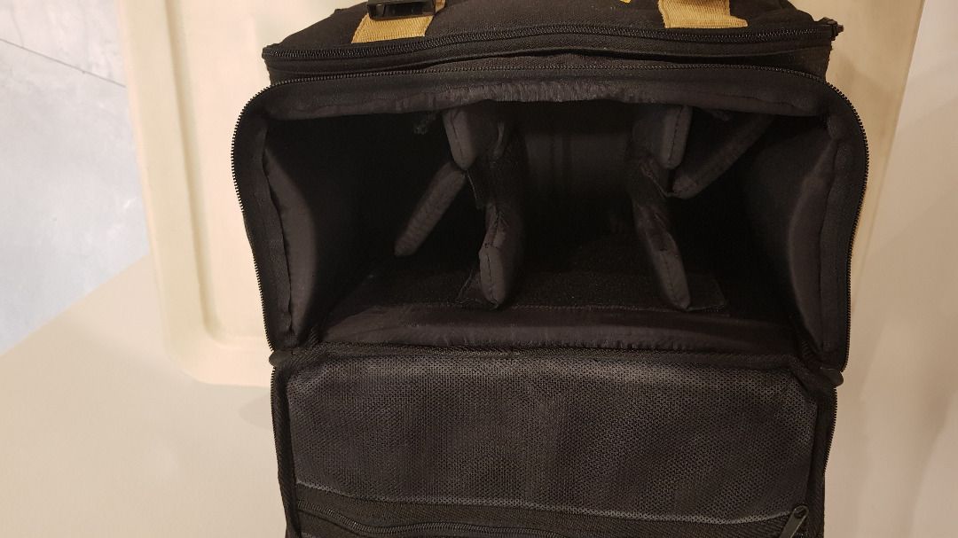 Nikon camera bag (Category: Briefcases) located in Quezon City. Submitted by xfiremaxx (Listing ID 1313626571, Image 2). Description: Pick up at Timog Morato area. Office hours. Nikon camera bag. First owner. Used. PHP1,200.00 or best offer. .