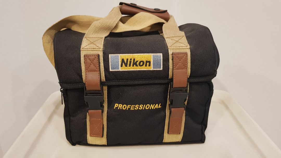 Nikon camera bag (Category: Briefcases) located in Quezon City. Submitted by xfiremaxx (Listing ID 1313626571, Image 1). Description: Pick up at Timog Morato area. Office hours. Nikon camera bag. First owner. Used. PHP1,200.00 or best offer. .