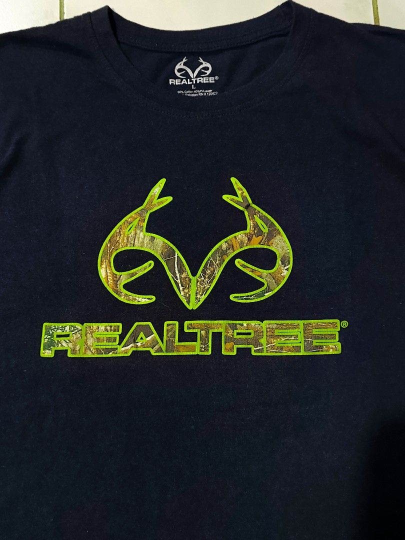 Realtree Script Tee (Category: Tshirts & Polo Shirts ) located in General Trias. Submitted by dot1thift (Listing ID 1313721635, Image 2). Description: Realtree script tee authentic/legit width: 21 length: 27 condition: 8/10 color rate: 8.5/10 issue: minimal cracked print, lints, need wash +SF 📩.