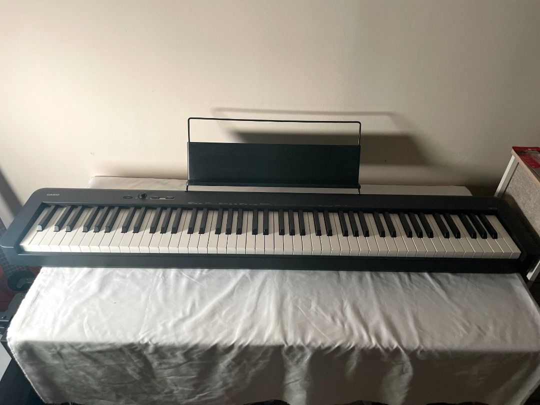 [RUSH SALE] Casio CDP-S110BKC2 Digital Piano (Category: Musical Instruments) located in Manila. Submitted by thrift_d (Listing ID 1313774096, Image 1). Description: 🔥 Casio CDP-S110BKC2 Digital Piano 🔥 📌 100% authentic, complete with box and receipt 📌 88 weighted keys 📌 Comes with adapter, user manual, lyric book stand, sustain pedal 📌 Barely used, gave up (no time) learning how to play the piano after a short while 📌 FREEBIES: Casio CS-46