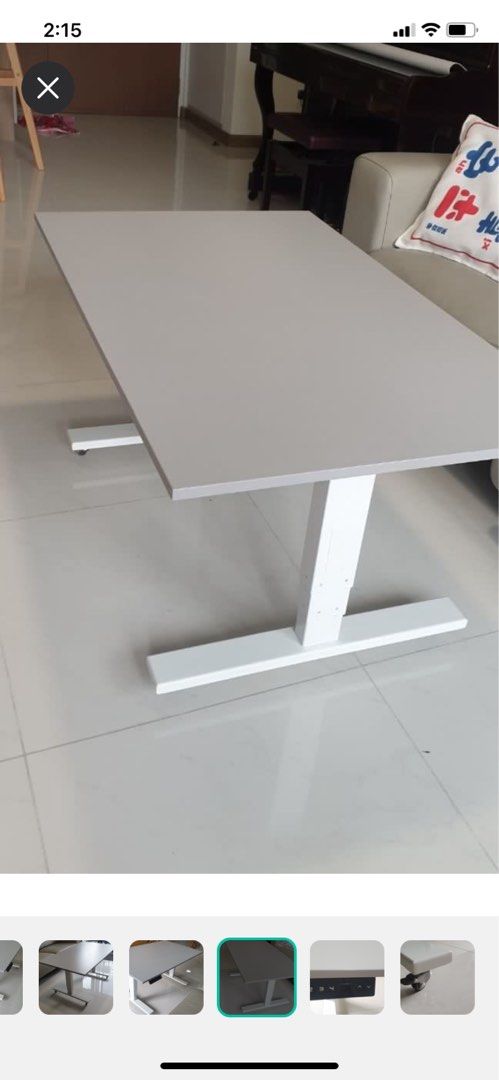 Table with adjustable height (multi usage) (Category: Tables & Sets) located in Singapore. Submitted by purebear.84cbc2 (Listing ID 1313665252, Image 1). Description: Excellent Condition Multiple usage: Good to use as study table, tea table , or dining table Come with locking wheels which are easy to move around, silent and scratch resistant Adjustable height: 42cm to 75cm Existing table top size: 67 x 110cm Already dismantled , able to fit in ca