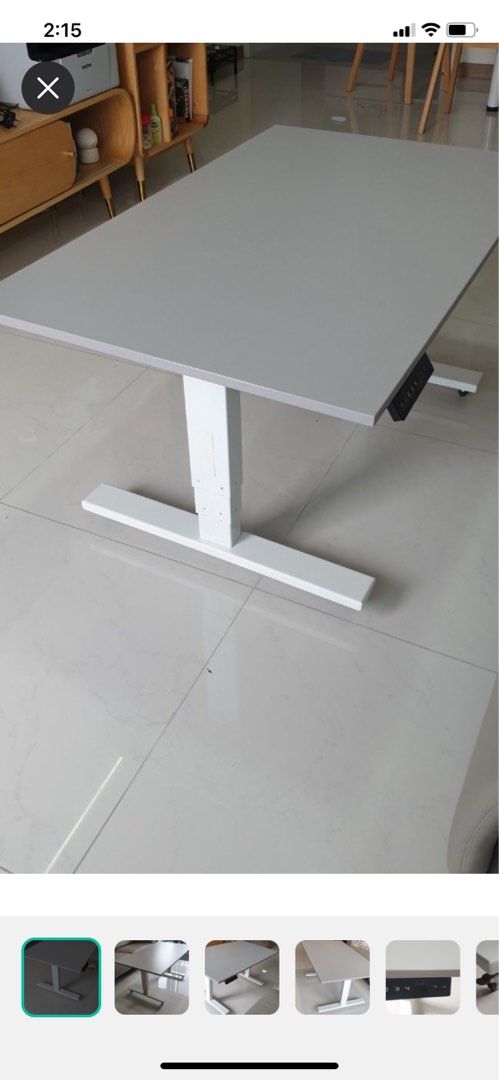 Table with adjustable height (multi usage) (Category: Tables & Sets) located in Singapore. Submitted by purebear.84cbc2 (Listing ID 1313665252, Image 3). Description: Excellent Condition Multiple usage: Good to use as study table, tea table , or dining table Come with locking wheels which are easy to move around, silent and scratch resistant Adjustable height: 42cm to 75cm Existing table top size: 67 x 110cm Already dismantled , able to fit in ca