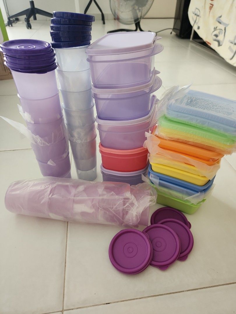 Tupperware set (Category: Other Kitchenware & Tableware) located in Singapore. Submitted by trendychic (Listing ID 1313650439, Image 2). Description: the whole set of tupperware consisting of 5 medium containers, 8 small containers, 10 cups with cover, and 6 small tumblers.