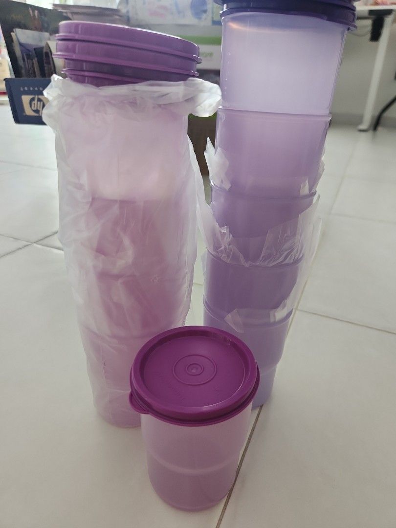 Tupperware set (Category: Other Kitchenware & Tableware) located in Singapore. Submitted by trendychic (Listing ID 1313650439, Image 3). Description: the whole set of tupperware consisting of 5 medium containers, 8 small containers, 10 cups with cover, and 6 small tumblers.