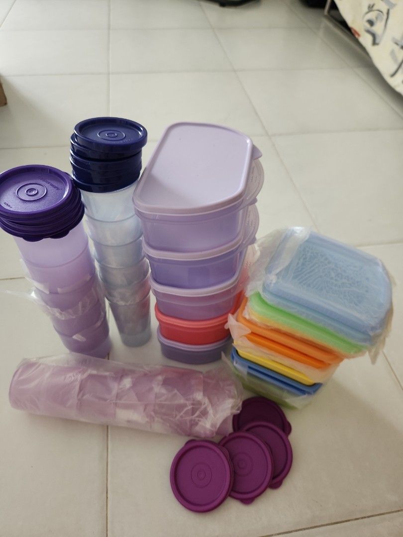 Tupperware set (Category: Other Kitchenware & Tableware) located in Singapore. Submitted by trendychic (Listing ID 1313650439, Image 1). Description: the whole set of tupperware consisting of 5 medium containers, 8 small containers, 10 cups with cover, and 6 small tumblers.