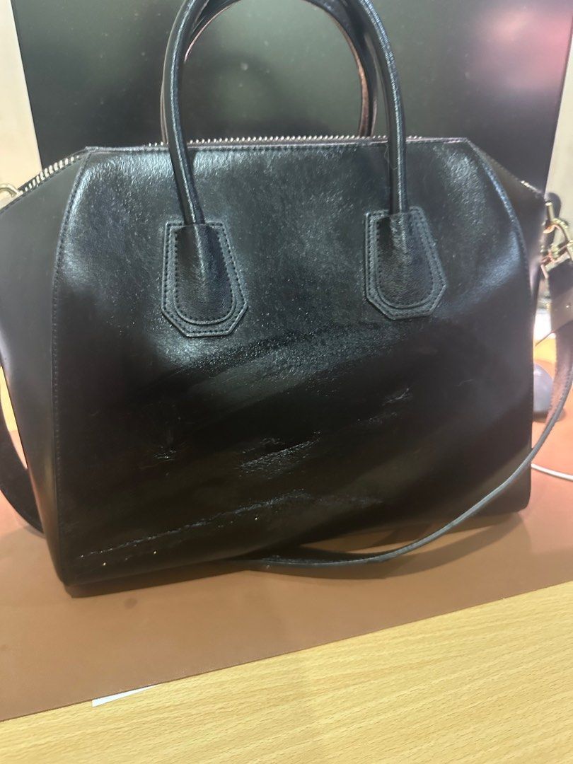 Authentic Givenchy Antigona Black Medium (Category: Luxury Bags & Wallets) located in Makati City. Submitted by kobewobee (Listing ID 1313949300, Image 2). Description: Guaranteed authentic With flaws after storing hence the price Im sad for not being able to store properly.
